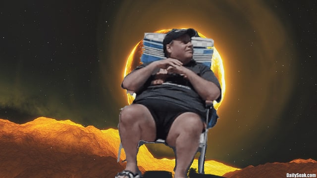 Chris Christie sitting on beach chair blocking out the sun.