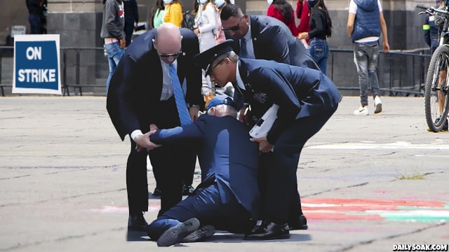 Joe Biden falling down while giving speech at UAW strike.