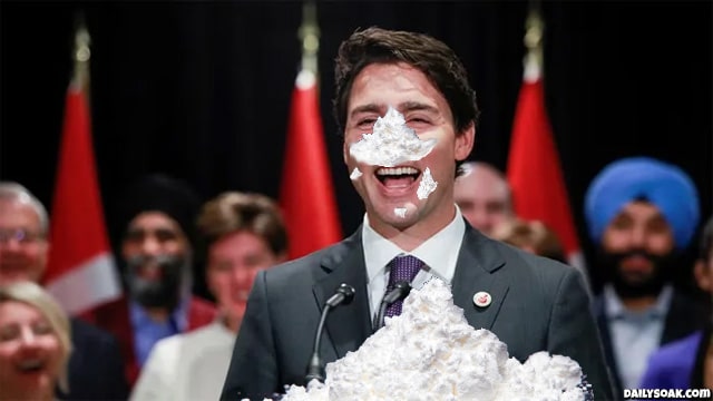 Justin Trudeau's face covered in white cocaine.