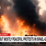 Parody CNN chyron in front of Israel Gaza city on fire.