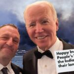 Joe Biden and Hawaii Governor Josh Green in front of the Lahaina fires.