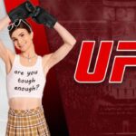 Trans influencer Dylan Mulvaney in dress in front of UFC logo background.