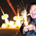 Kim Jong-un laughing while nuclear bombs explode.