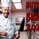 Joe Biden wearing a white butcher's uniform standing inside a meat butcher shop.