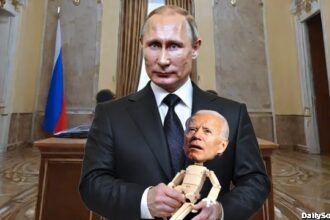 Russian President Vladimir Putin holding a joe Biden puppet.