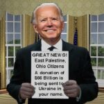 Joe Biden holding up a donation paper for East Palestine, Ohio.