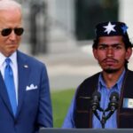 Joe Biden standing with an illegal alien from Guatemala at southern border.