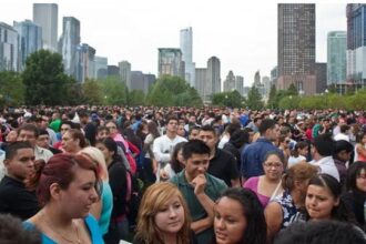 Thousands of illegal aliens standing in New York City during an earthquake.