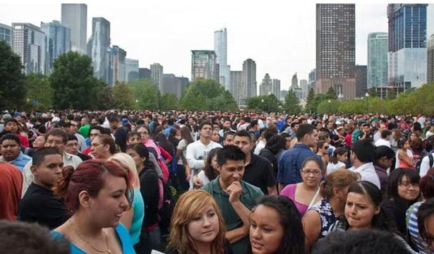 Thousands of illegal aliens standing in New York City during an earthquake.