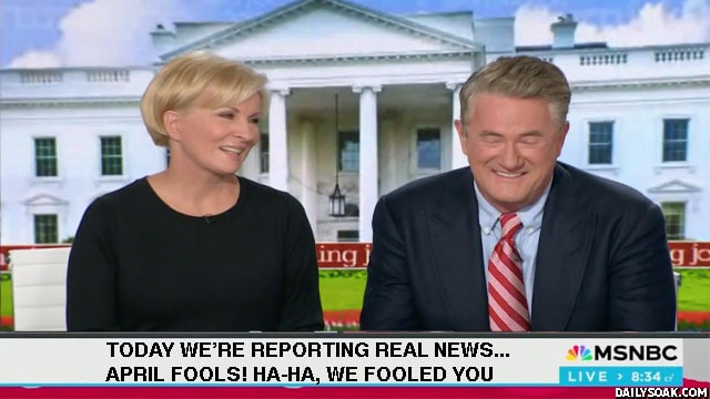 MSNBC host Joe Scarborough laughing on April Fools' Day.
