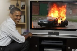 Barack Obama playing a simulated drone strike videogame.