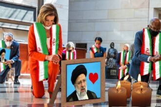 Democrats kneeling for dead Iran President Ebrahim Raisi.