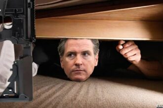 California Governor Gavin Newsom hiding under his bed in fear of guns.