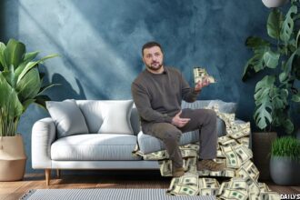 Ukraine President Zelensky sitting on money under a couch cushion.