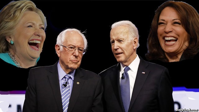 Joe Biden and Bernie Sanders on stage during a debate.