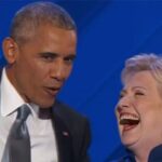 Democrat party members Hillary Clinton and Barack Obama laughing.