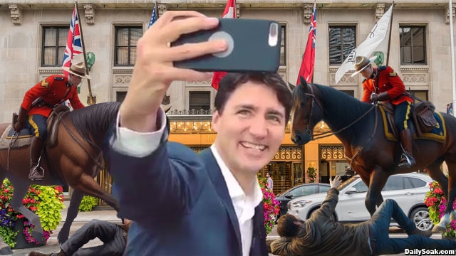 Justin Trudeau taking a selfie in front of horse trampling Canadian Mounties on Canada Day.