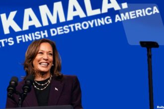 Kamala Harris on the campaign trail with her new slogan.