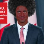 Justin Trudeau in blackface on stage.