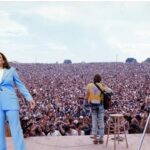 Kamala Harris in front of a large crowd of people at a rally posted on the Harris campaign account.