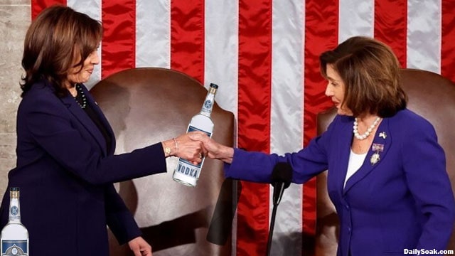 Nancy Pelosi and Kamala Harris holding a bottle of alcohol.