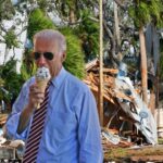 Joe Biden eating ice cream while surveying hurricane damage.