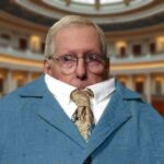 Mitch McConnell retreating into his suit jacket like a turtle.