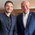 Tim Walz and Alex Soros inside of a New York City apartment.