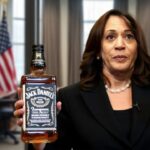 Kamala Harris drunk on campaign trail holding two bottles of whiskey and bourbon.