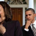 Barack Obama staring angrily at Kamala Harris.