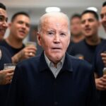 Joe Biden standing amongst a group of Mexican cartel members.