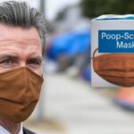 Gavin Newsom wearing a brown mask so he doesn't have to smell poop in California.