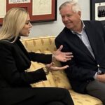 Two ladies Lindsey Graham and Pam Bondi gossiping inside Senate office.