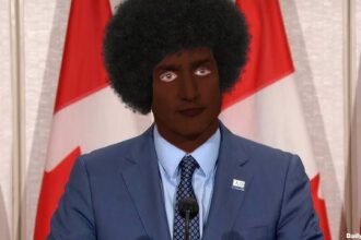 Justin Trudeau wearing blackface.