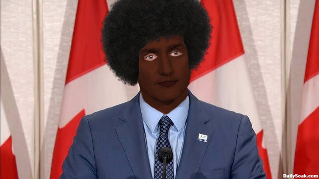 Justin Trudeau wearing blackface.