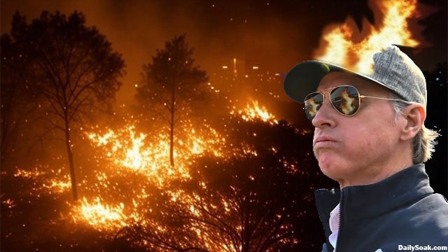 Gavin Newsom in front of an AI-generated deepfake of California wildfires.