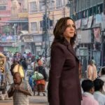 Kamala Harris walking a street in India after being deported by Trump.