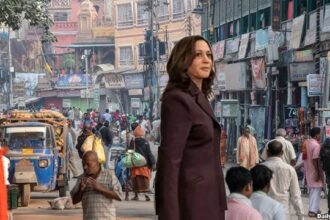 Kamala Harris walking a street in India after being deported by Trump.