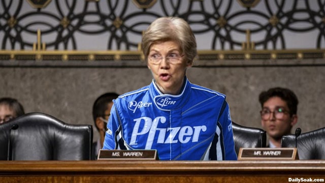 Elizabeth Warren wearing a Pfizer jacket at RFK Jr. confirmation.