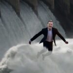 Gavin Newsom standing in front of California dam Trump opened up.