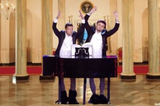 Volodomyr Zelensky playing penis piano inside White House for Trump.