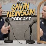 Gavin Newsom interviewing himself in a mirror on his new This is Gavin Newsom podcast.