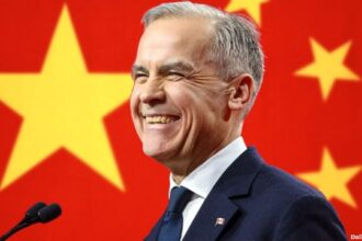 Canada Prime Minister Mark Carney in front of China flag.