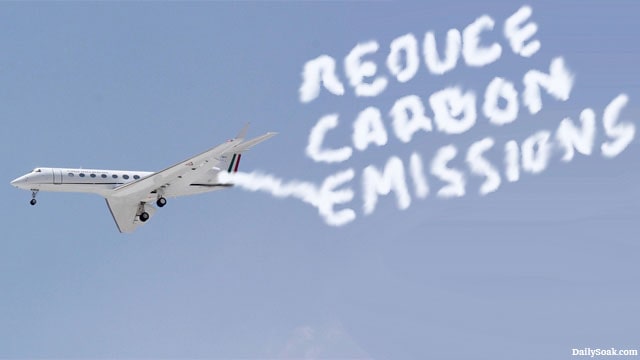 Bernie Sanders private jet in sky contrails spelling out word "Reduce Carbon Emissions."