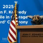 Fly that landed on Mike Pence's head sitting on podium.