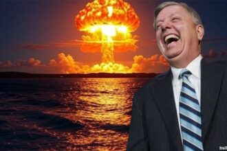 Warmonger Lindsey Graham laughing at a nuclear explosion.