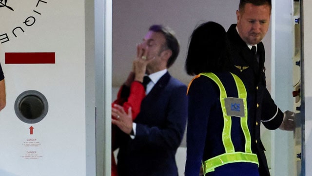 Emmanuel Macron getting punched in the face by wife Brigitte for leaving toilet seat down.