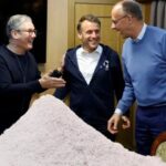 UK's Keir Starmer, Emmanuel Macron, and Friedrich Merz with coke on train.
