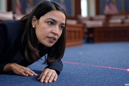 AOC in Congress chasing a red laser pointer like a cat.