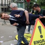 Wax statue of French President Emmanuel Macron being stolen by Greenpeace activists.